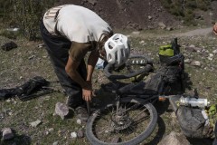 First puncture , Descending Kegeti pass, Kyrgyzstan, Friday, Aug. 27, 2021.  (Yam G-Jun)